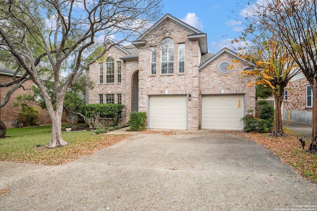 front of property with a garage