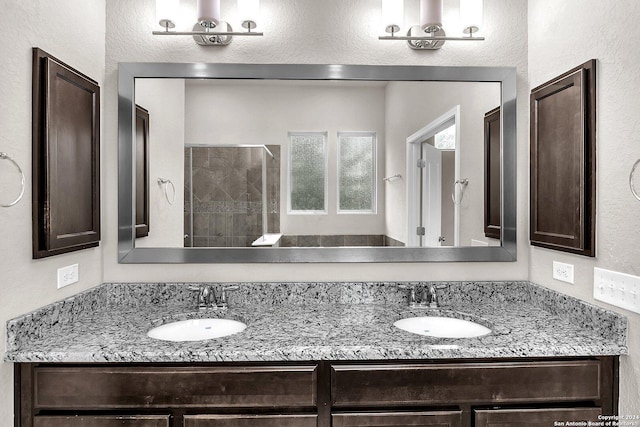 bathroom with vanity and walk in shower