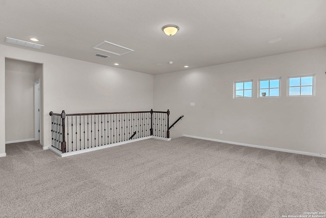 spare room with carpet flooring