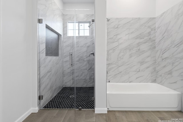 bathroom with a shower with shower door