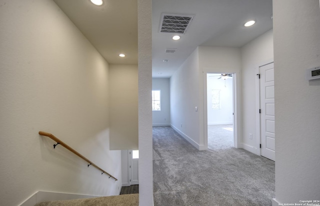 hallway featuring carpet