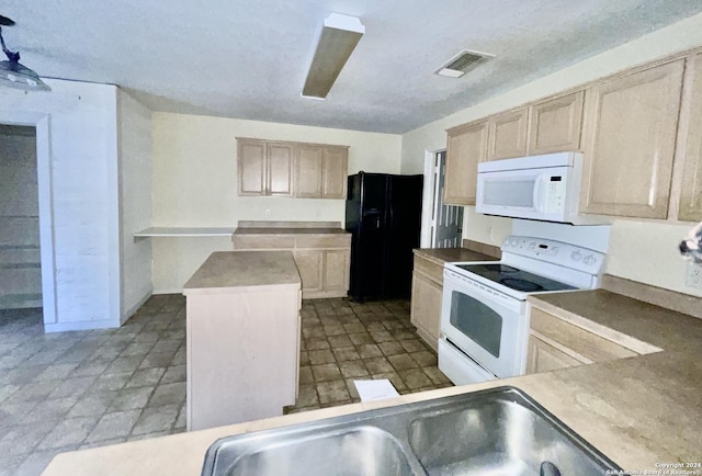 kitchen featuring a center island, white appliances, sink, and light brown cabinetry