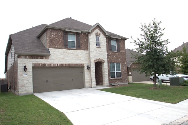 view of front of house featuring a garage and a front yard