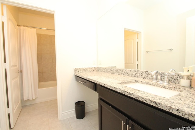 bathroom featuring vanity, tile patterned flooring, and shower / bathtub combination with curtain