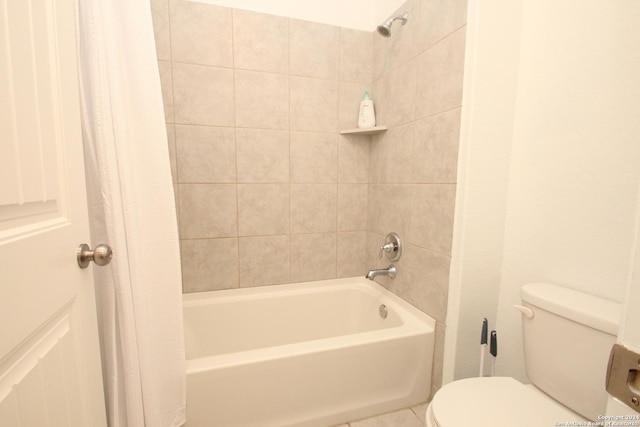 bathroom featuring tile patterned floors, toilet, and shower / tub combo with curtain