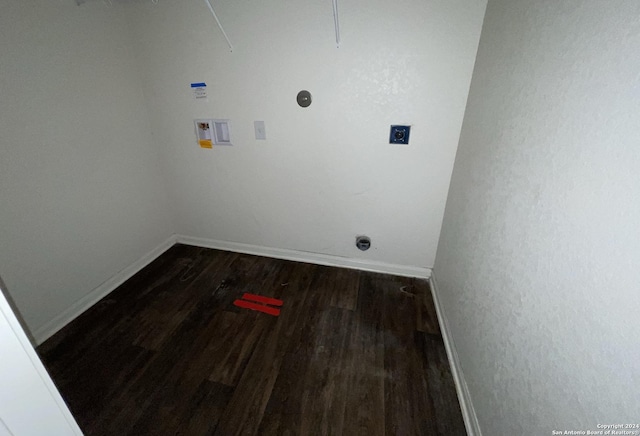 laundry area featuring washer hookup and dark hardwood / wood-style flooring