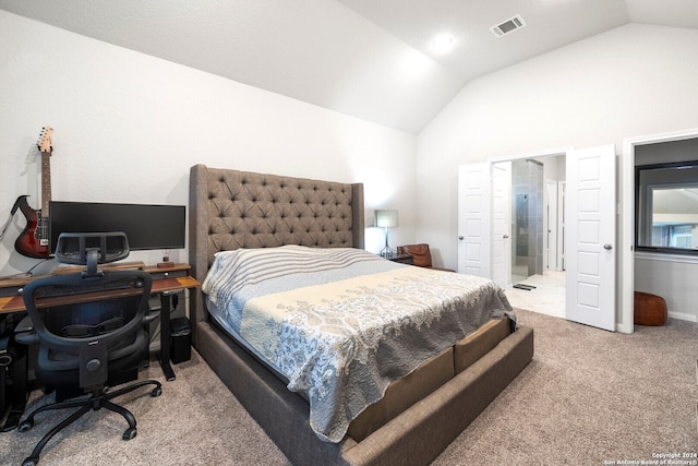 carpeted bedroom featuring vaulted ceiling