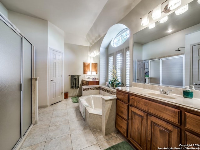 bathroom featuring tile patterned floors, vanity, and independent shower and bath