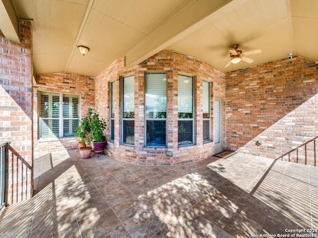 view of patio / terrace featuring ceiling fan