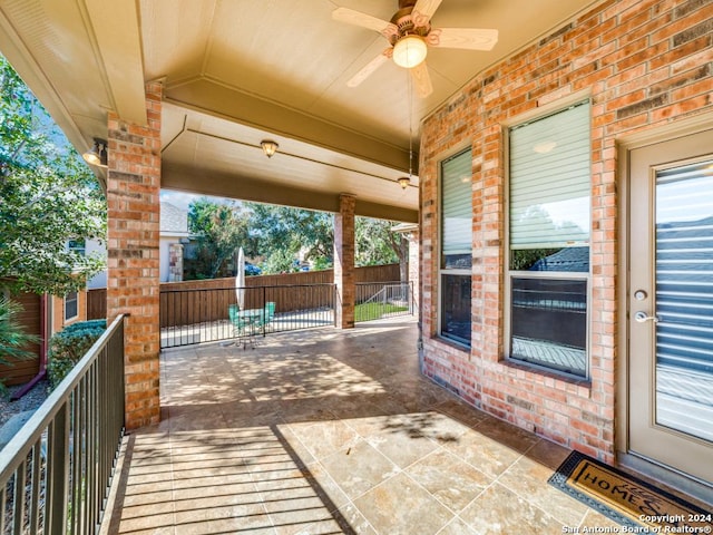 view of patio / terrace featuring ceiling fan