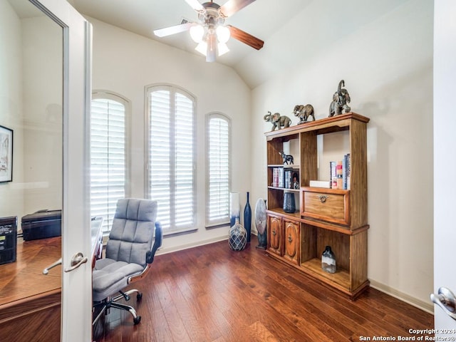 office featuring dark hardwood / wood-style floors, ceiling fan, and lofted ceiling