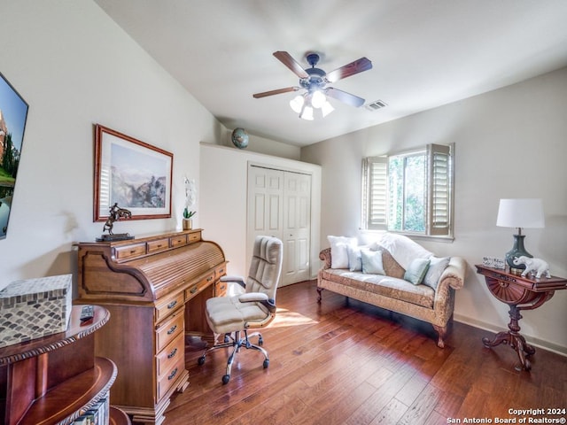 office with ceiling fan and dark hardwood / wood-style floors