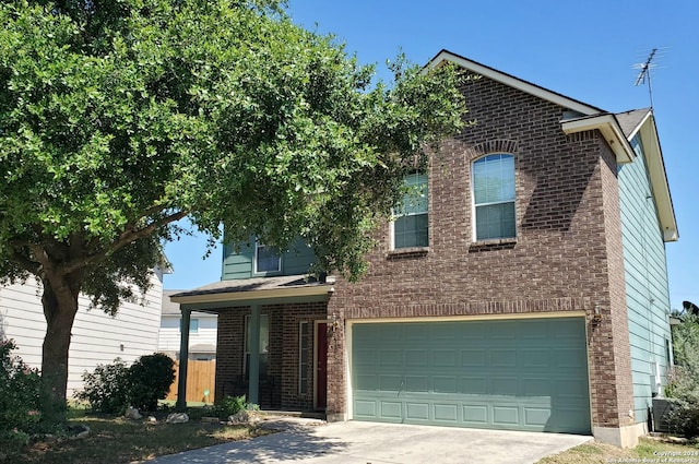 front of property with a garage