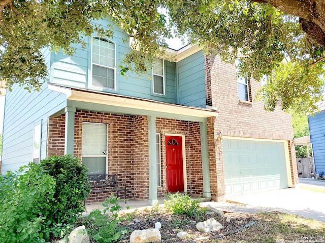 view of front of property with a garage