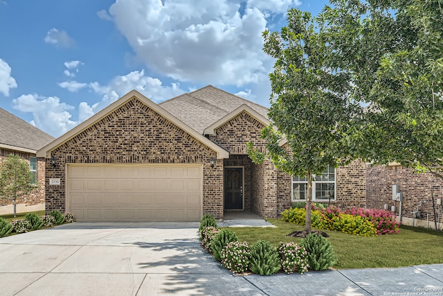 view of front of property featuring a garage