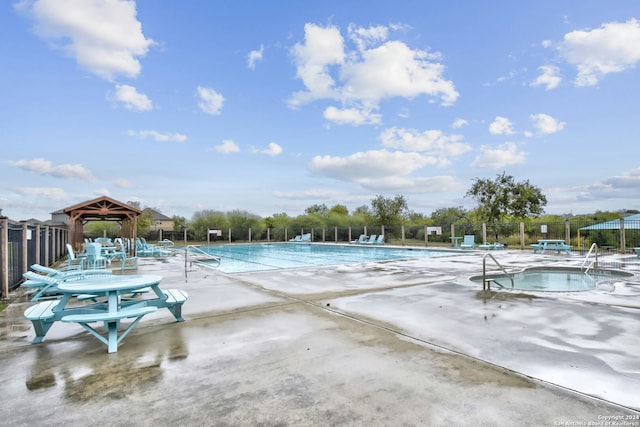 view of pool featuring a patio