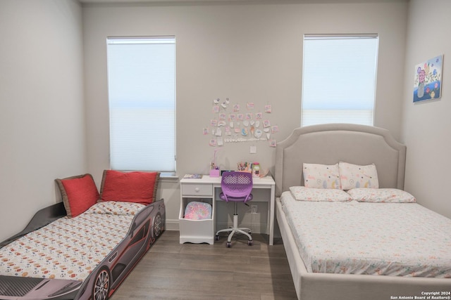 bedroom featuring dark hardwood / wood-style floors