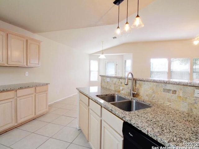 kitchen featuring decorative backsplash, sink, pendant lighting, light tile patterned floors, and black dishwasher