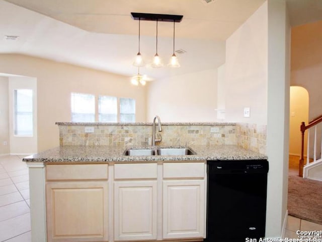 kitchen with light tile patterned floors, black dishwasher, tasteful backsplash, and sink