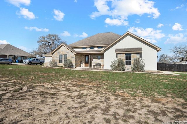 view of front of home with a front yard