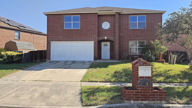 view of property with a garage and a front yard