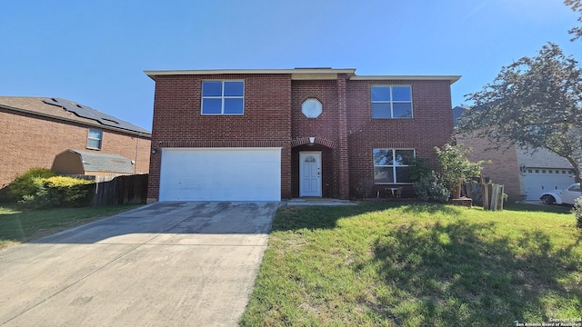 view of front facade with a garage and a front lawn