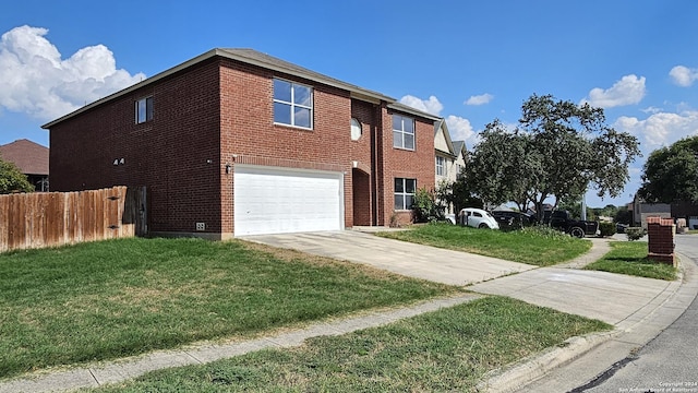 view of side of home with a yard and a garage