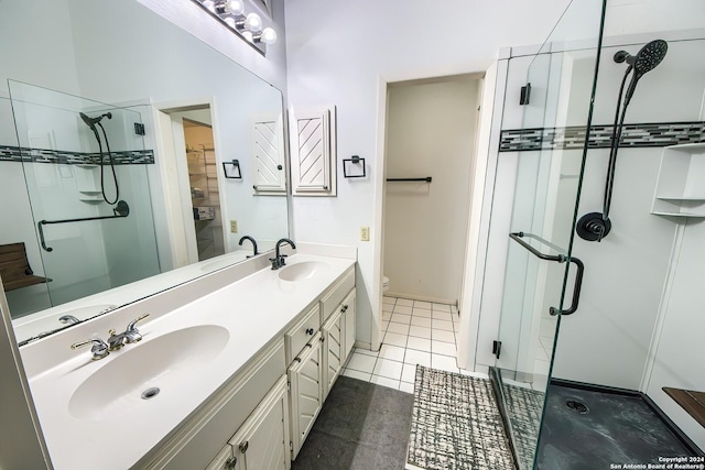 bathroom featuring toilet, vanity, tile patterned floors, and walk in shower