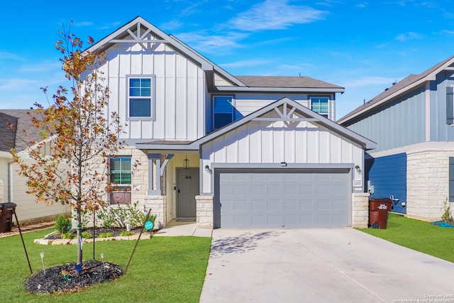 view of front of house with a garage and a front lawn