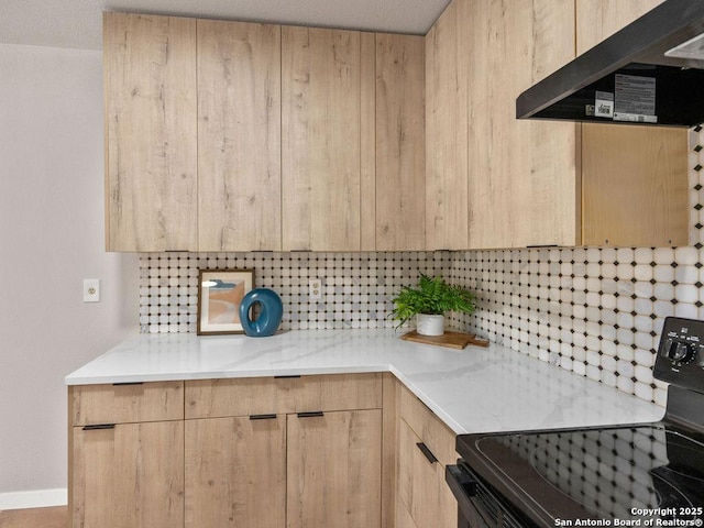 kitchen with ventilation hood, light brown cabinets, black range with electric stovetop, and backsplash