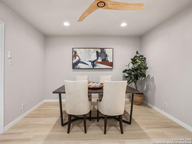 dining area featuring light wood-type flooring