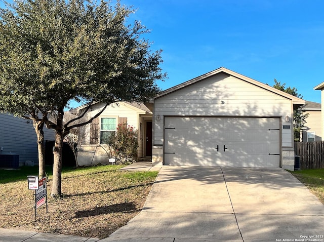 ranch-style home with central air condition unit