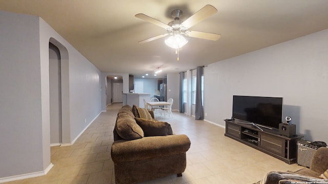 living room featuring ceiling fan