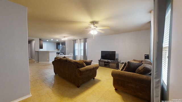 living room featuring ceiling fan