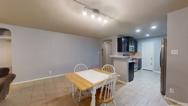 dining room with light tile patterned floors