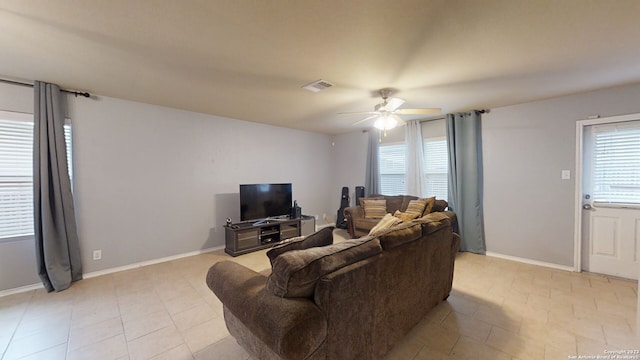 living room featuring ceiling fan