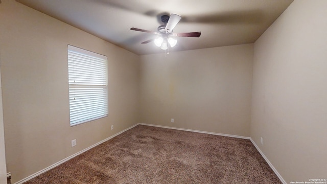 unfurnished room featuring carpet and ceiling fan