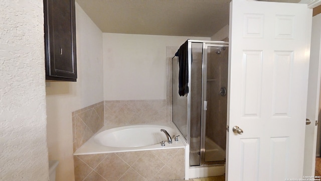 bathroom with independent shower and bath