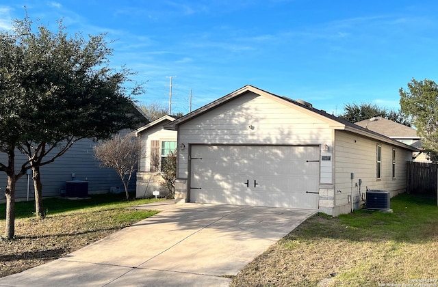 single story home with a garage, central air condition unit, and a front lawn