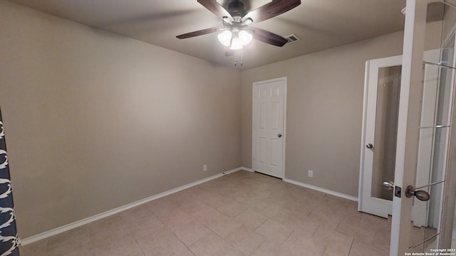 unfurnished room featuring ceiling fan