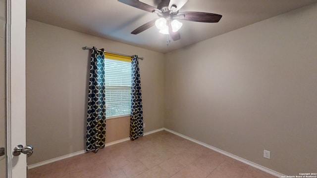 unfurnished room with ceiling fan