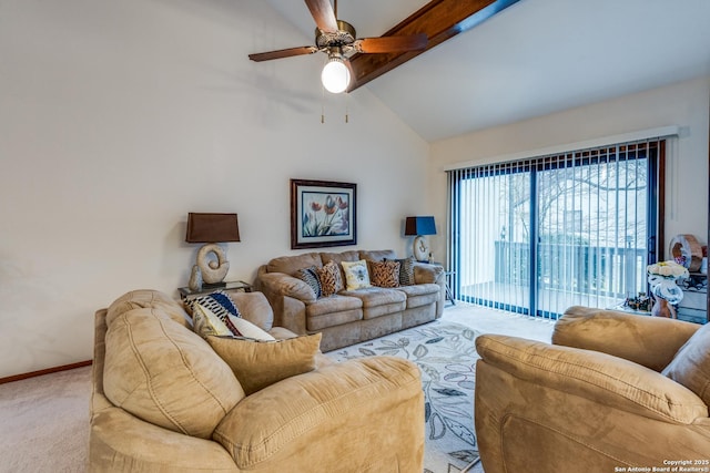 living room featuring lofted ceiling with beams, ceiling fan, and light carpet