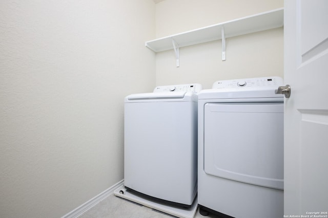 laundry room featuring washer and clothes dryer