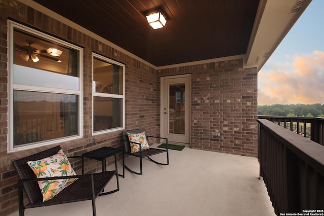 view of balcony at dusk