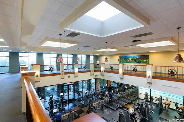 gym featuring a paneled ceiling