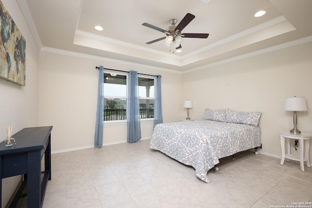 bedroom featuring light tile patterned floors, a tray ceiling, ceiling fan, and ornamental molding