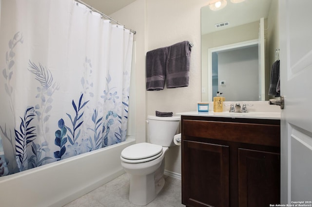 full bathroom with tile patterned floors, vanity, toilet, and shower / bath combo with shower curtain