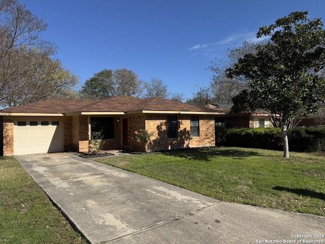 ranch-style home with a garage and a front lawn