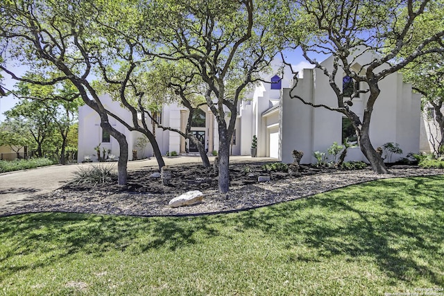 view of yard featuring a garage