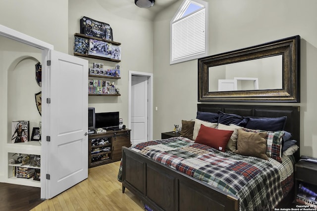 bedroom with light hardwood / wood-style flooring